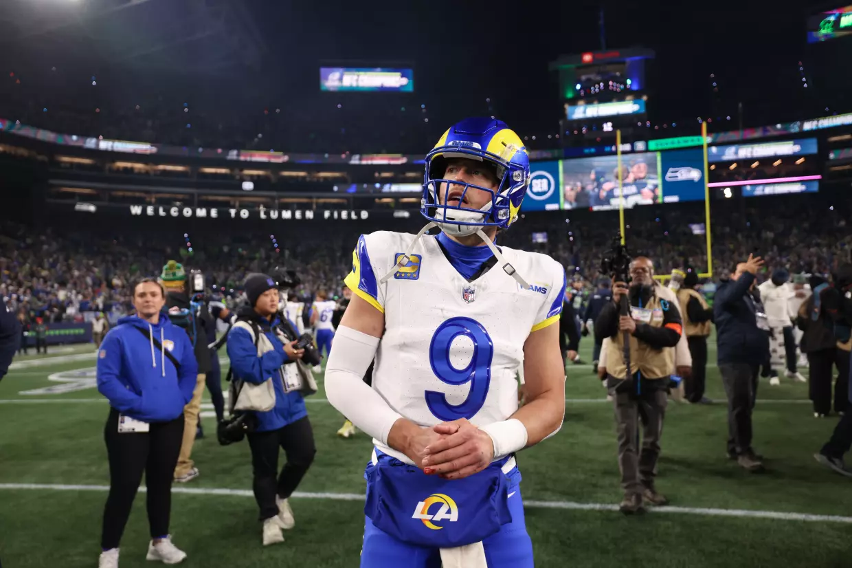 Rams quarterback Matthew Stafford walks off the field after a 31-27 loss to the Seattle Seahawks in the NFC championship game Sunday at Lumen Field. (Eric Thayer / Los Angeles Times)